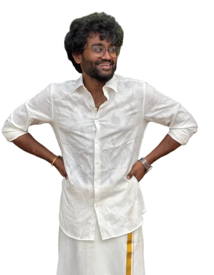 David Sling laughing, hands on hips, in a white shirt